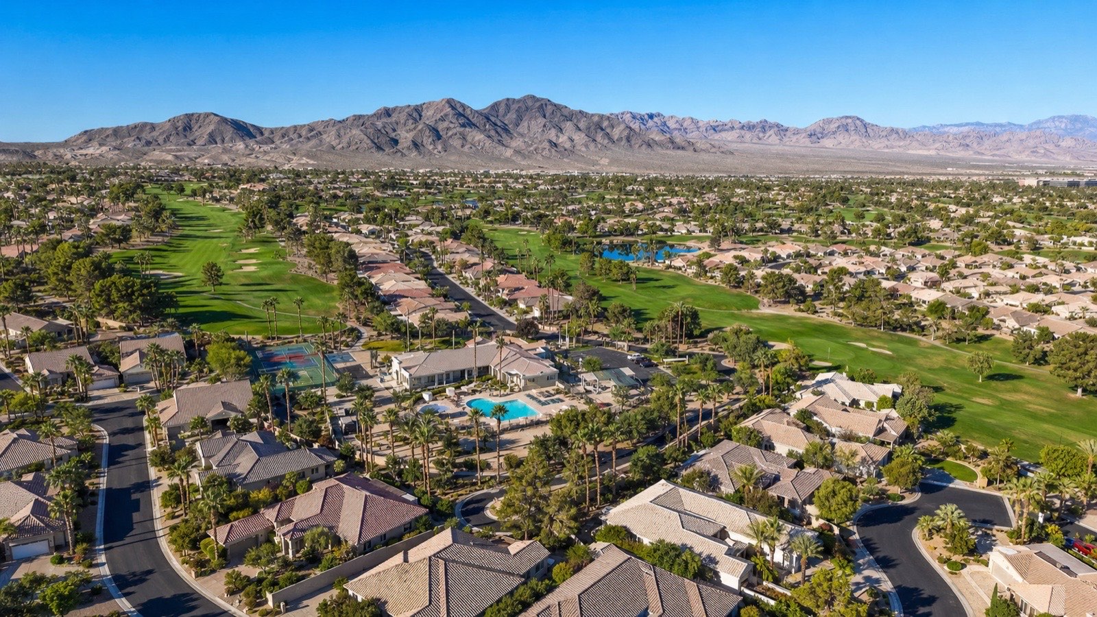 Aerial view of the Las Vegas valley with mountains beyond, the destination for Illinois families relocating from Chicago